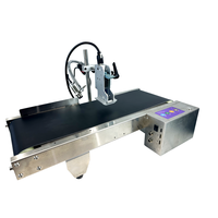Mini-convoyeur automatique Imprimante à jet d'encre pour les dates d'expiration Machine d'impression en ligne de boîtes de conserve de bouteilles en plastique de cartons de date d'expiration