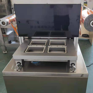 Machine d'emballage sous atmosphère modifiée (ORM) pour aliments cuits, poisson, avec plateau sous vide, scellage cutané et rinçage à l'azote - Product Image 5