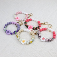 Porte-clés et porte-monnaie à perles en silicone style floral pour femme