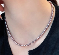 Style traditionnel chinois de la haute société, perles d'eau douce naturelles violettes, perles densement enfilées.