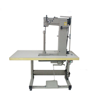 Machine à coudre industrielle à pied haute efficacité en acier durable avec table à coudre rapide pour les vêtements en cuir de jean lourds