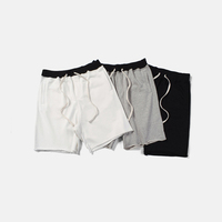 Shorts de sport amples décontractés à bords bruts bicolores style hip-hop de marque américaine tendance pour logo personnalisé