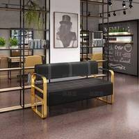 Canapé de salon moderne en tissu doux, design épuré, avec éléments en acier inoxydable, pour la maison et les espaces d'attente