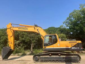 Excavatrice sur chenilles Hyundai 305LC-9T d'occasion de haute qualité, 30 tonnes, avec accessoire de pince, attache rapide et brise-roche - Product Image 2