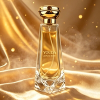 Flacon de parfum rectangulaire en verre transparent de luxe de 100 ml, bouchon doré, gravure de logo personnalisée, vaporisateur à pompe, boîte cadeau