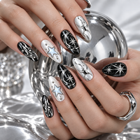 30 faux ongles gothiques faits à la main, forme amande moyenne, avec papillons 3D, étoiles argentées et motifs irréguliers, prêts à poser, style punk noir