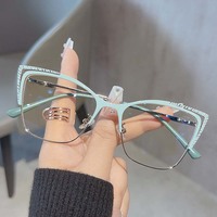 Nueva moda ojo de gato Anti luz azul gafas mujeres Metal colorido personalizado ordenador espejo plano gafas marco