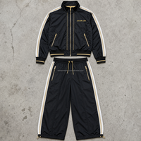 Ensemble décontracté deux pièces pour homme avec haut zippé et pantalon de jogging à cordon de serrage, imprimé toile étoilée noire, OEM ODM