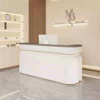 Mobilier commercial contemporain minimaliste rose blanc comptoir avant table de luxe salon de beauté réception pour magasin