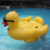 Flotteur de piscine gonflable géant en forme de canard jaune