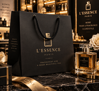 Sac de parfum de luxe en papier couché recyclable personnalisé avec ruban, gaufrage/débossage, impression sérigraphique, logo doré pour emballage de parfum