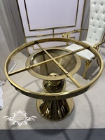 Table de mariage ronde dorée pour gâteau