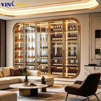 Vitrine à vin sur mesure haut de gamme en acier inoxydable à température normale avec éclairage LED, cadre arqué et verre trempé