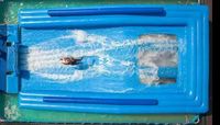Simulateur de surf gonflable commercial portable bleu clair en PVC et acier inoxydable 304, 2 personnes, 100 kg, prix bas