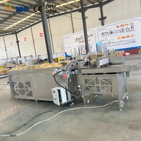 Machine d'enrobage au chocolat industrielle de qualité supérieure avec tunnel de refroidissement pour la production de barres énergétiques, de barres protéinées et de revêtements de bonbons