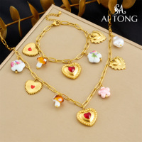 Vente en gros d'usine, collier, bracelet et boucles d'oreilles en acier inoxydable plaqué or 18 carats, motif trèfle, fleur, cœur, ensemble de bijoux pour femmes, usage quotidien