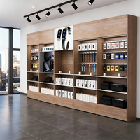 Table de présentation de téléphones mobiles sur mesure moderne avec vitrine d'accessoires pour l'aménagement de magasins de détail de marques