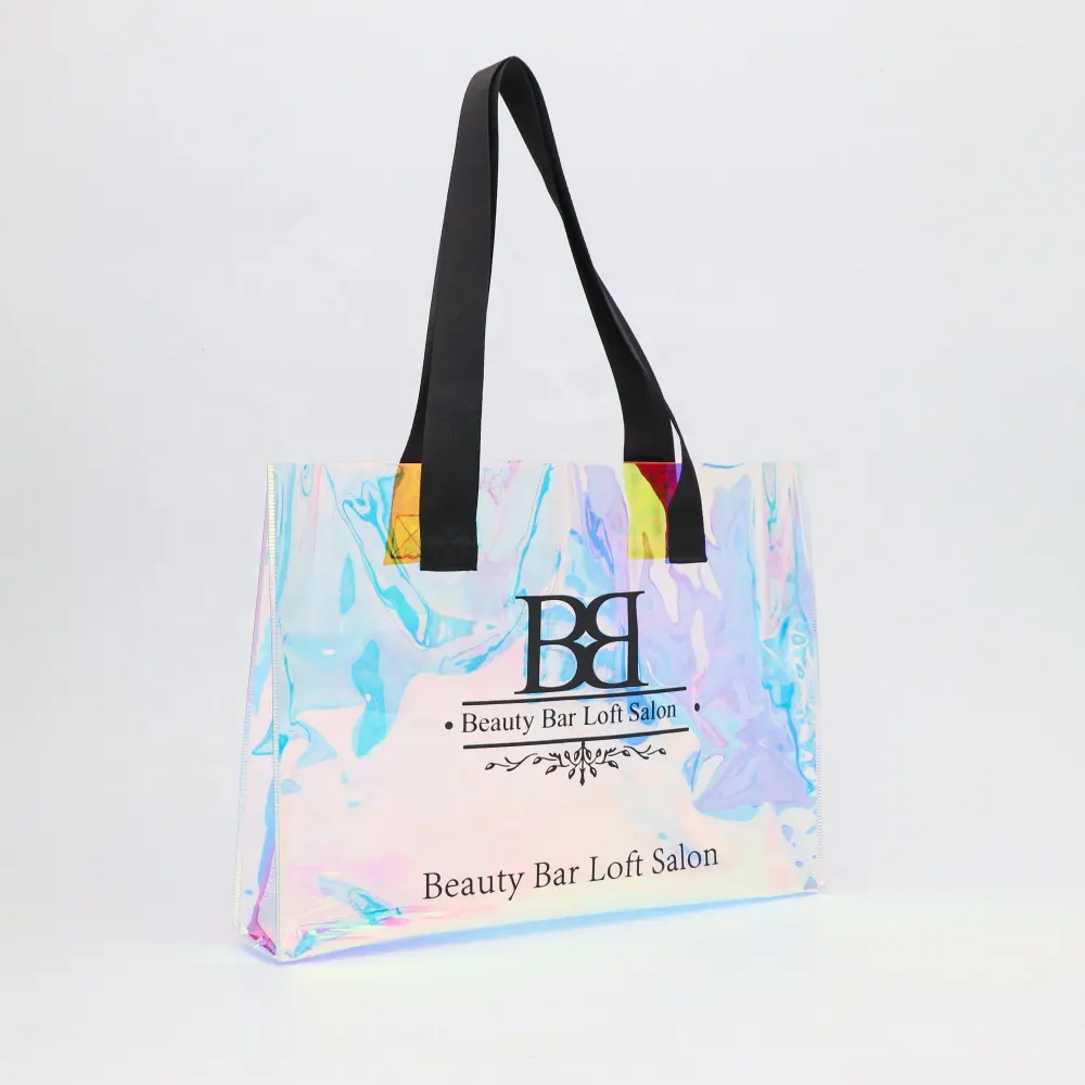 Borsa di plastica per lo shopping regalo di lusso con il tuo logo shopping olografico in pvc personalizzato tote bag trasparente