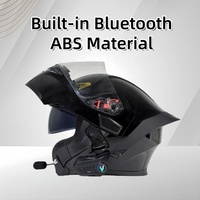 Casque de moto intégral ABS à visière relevable, double visière, avec écouteurs intégrés, unisexe, pour motocross, fabriqué par un fabricant de casques de moto.