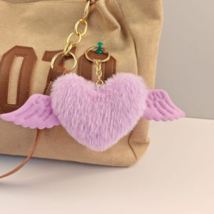 Porte-clés en peluche en forme de cœur ailé mignon, charme de sac en fourrure <span class=keywords><strong>d</strong></span>'ange, ornement de sac à dos pour cadeau de réunion de fête, vente en gros - Product Image 5