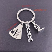 Porte-clés en métal argenté avec symbole scientifique 3D, molécule ADN double hélice, microscope, chimie, pour médecins, pendentifs, cadeaux, breloques de sac