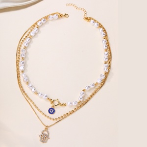 Collar de cadena de eslabones de <span class=keywords><strong>perlas</strong></span> doradas con colgante de aleación de imitación de <span class=keywords><strong>ojos</strong></span>, elegante y de nicho, para mujer, estilo vintage, para la clavícula. - Product Image 4