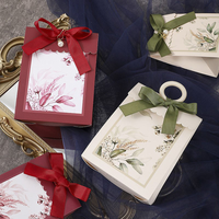 Boîte en carton rigide personnalisée avec design à fentes et gaufrage unique pour emballage cadeau de chocolat de mariage