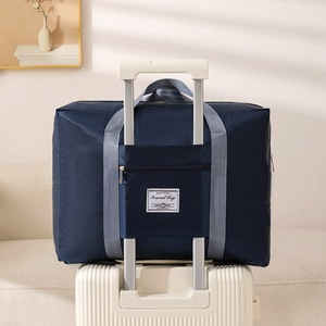 Sac de voyage grande capacité pliable et imperméable avec étui à roulettes pour voyage unisexe beige noir gris bleu marine rose bleu - Product Image 3