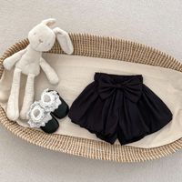 Ärmellose Weste mit Schleifendekor und Shorts in Knospenform, zweiteiliges Sommeroutfit für Babymädchen