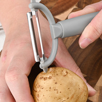 Professionele handmatige roestvrijstalen fruit-, appel-, aardappel-, wortel- en groenteschiller met meerdere functies voor thuisgebruik