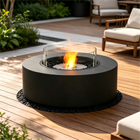Cheminée bioéthanol autoportante moderne en acier inoxydable Vales, flamme réelle, chauffage décoratif, intérieur/extérieur, salle à manger, hôtel, villa