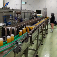 Ligne de production rentable de jus de mangue naturelle Usine de traitement de fruits entièrement automatique avec système de pasteurisation et de remplissage
