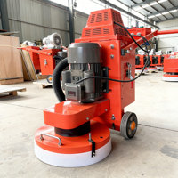 Machine professionnelle de ponçage de sols en béton et terrazzo avec moteur électrique pour la finition des surfaces en pierre