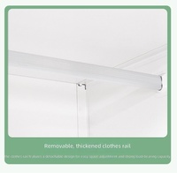 Armoire convertible autoportante en acier avec double porte coulissante verrouillable, miroir imprimé, pour chambre, salle de sport, design moderne et portable pour la maison