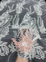 Tissu de dentelle de mariage blanc luxueux à sequins et perles