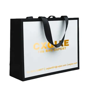 Özelleştirilmiş baskı kendi logo lüks marka kozmetik giyim ayakkabı hediyeler için kağıt alışveriş torbası butik çanta şerit kolu ile