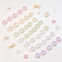 Accessoires pour ongles Macaron Hollow Star, petits charms en résine en forme d'étoile, décorations florales aux couleurs pastel pour salon de manucure