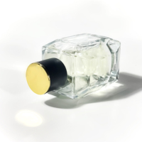 Vente en gros de flacons de parfum de nouvelle conception, flacons d'huiles essentielles, flacons de parfum pour voiture, emballage de luxe, flacons de parfum uniques de 100 ml