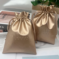 Pochette d'emballage cosmétique en cuir PU doré haut de gamme avec logo personnalisé en relief, sac cadeau shopping en cuir doré brillant