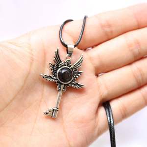 Venta caliente 3,5 cm cristal natural Aleación de obsidiana natural con incrustaciones de collar de llave de alas de poder de Dios guardián - Product Image 5