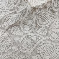 Guangzhou grande goutte d'eau broderie 3D plaque broderie dentelle cajou pur coton fil tissé Technique creux maille tissu pour