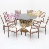 Tables et chaises de banquet de mariage en verre rond en acier inoxydable doré de luxe en gros de Chine pour événements festifs