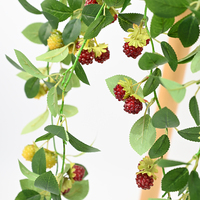 Vente en gros de feuilles vertes artificielles de framboisier pour décorations d'intérieur, accessoires de photographie, présentoirs de cuisine et décorations de table.