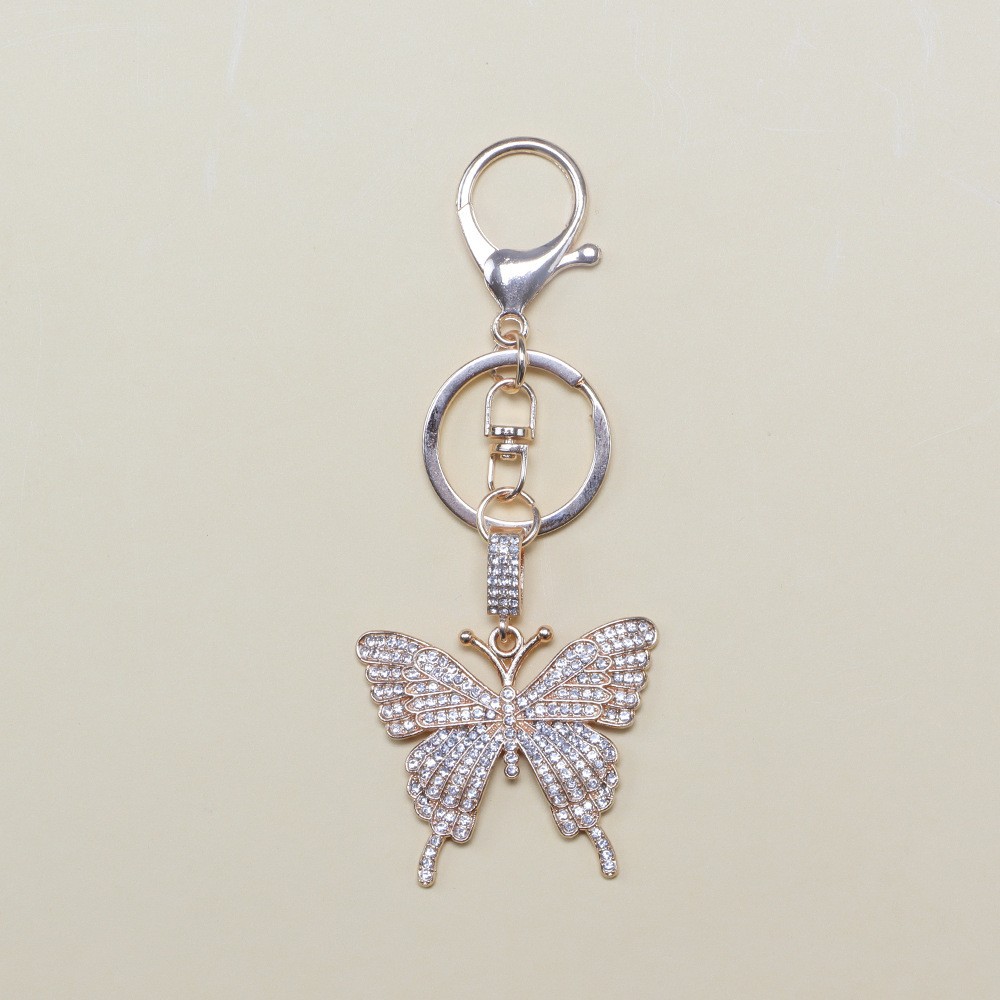 Boucle de homard papillon doré