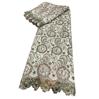 Tissu de robe de soirée africaine en mousseline de soie rose pastel multicolore à motif floral cachemire, brodé de dentelle et de petites paillettes, avec bordure inférieure ajourée
