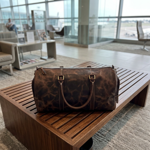 Bolsa de Viaje de Cuero Genuino Unisex de Alta Calidad, Ligera, 56-75L, Diseño Único y Duradero con Cierre - Product Image 1