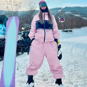 Yüksek kalite özel giyim imalatı kar pantolon Baggy rüzgarlık su geçirmez erkek kadın vinç kayak tulumu kurulu Snowpants