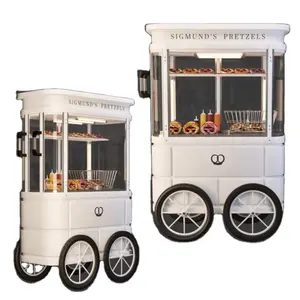 Mobile street vending carts pushing donut popcorn sale
