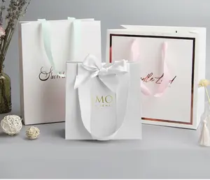 Sacs à provisions pour vêtements personnalisés sacs en papier pour cadeaux sacs en papier d'emballage avec votre propre logo