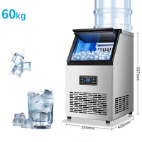 Petite machine à glaçons commerciale domestique pour les magasins de thé au lait Sortie quotidienne 55KG Technologie refroidie par air Plateaux à glace en cuivre pur